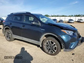 2018 Toyota RAV4 Hybrid SE with VIN JTMJJREV2JD230126, listed as a Copart auction lot 62574005 with 196,846 mi miles and Salvage title. Bid and sale history available at DreamBid. Image 4.