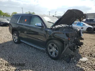 2015 Chevrolet Tahoe LTZ with VIN 1GNSKCKC2FR289034, listed as a Copart auction lot 57067225 with Not provided miles and Salvage title. Bid and sale history available at DreamBid. Image 4.