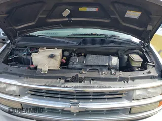 2002 Chevrolet Express with VIN 1GBFG15R021183484, listed as a IAAI auction lot 41622469 with 145,407 mi miles. Bid and sale history available at carsss.com. Image 10.
