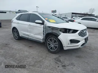 2019 Ford Edge Titanium z VIN 2FMPK3K92KBC72875, wystawiony jako IAAI lot #41521089 z przebiegiem 75 227 mil mil oraz . Historia ofert i sprzedaży dostępna na DreamBid. Obrazek 1.