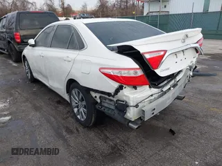2016 Toyota Camry XSE with VIN 4T1BK1FK2GU570484, listed as a IAAI auction lot 41395359 with 122,852 mi miles. Bid and sale history available at carsss.com. Image 3.