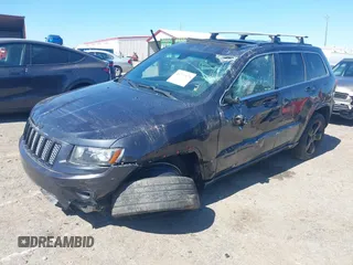 2014 Jeep Grand Cherokee Laredo with VIN 1C4RJEAG0EC580675, listed as a IAAI auction lot 41773879 with 127,714 mi miles. Bid and sale history available at carsss.com. Image 2.