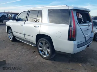 2018 Cadillac Escalade Luxury with VIN 1GYS3BKJ7JR140183, listed as a IAAI auction lot 40769705 with 106,774 mi miles. Bid and sale history available at carsss.com. Image 3.