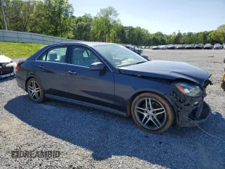 2016 Mercedes-Benz E 350 Sport with VIN WDDHF5KB1GB198217, listed as a Copart auction lot 52678485 with 89,829 mi miles and Salvage Title. Bid and sale history available at DreamBid. Image 4.