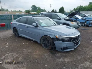 2021 Honda Accord Touring with VIN 1HGCV2F94MA001265, listed as a IAAI auction lot 42448492 with Not provided miles and . Bid and sale history available at DreamBid. Image 1.