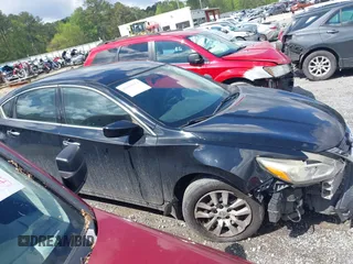 2016 Nissan Altima SR with VIN 1N4AL3APXGC199128, listed as a IAAI auction lot 42002359 with 202,852 mi miles and . Bid and sale history available at DreamBid. Image 13.