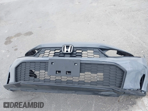 2025 Honda Civic Sport z VIN 19XFL2H83SE015318, wystawiony jako IAAI lot #42209878 z przebiegiem 1322 mil mil oraz . Historia ofert i sprzedaży dostępna na DreamBid. Obrazek 20.