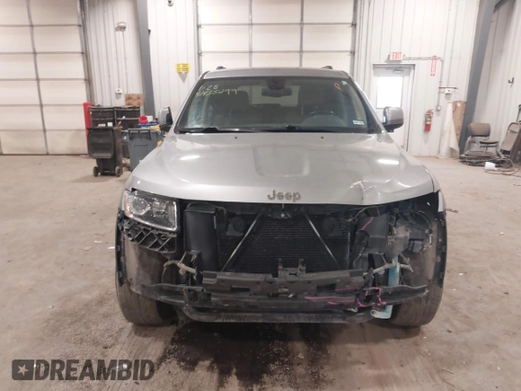 2015 Jeep Grand Cherokee Laredo with VIN 1C4RJFAG4FC797069, listed as a IAAI auction lot 41435299 with 146,755 mi miles. Bid and sale history available at carsss.com. Image 12.