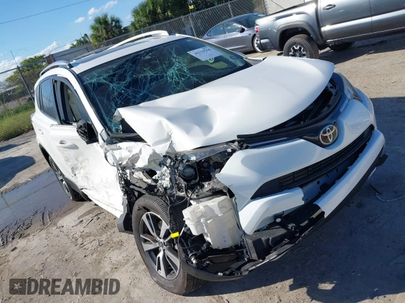 2018 Toyota RAV4 XLE with VIN JTMWFREV8JJ157496, listed as a IAAI auction lot 41816017 with 64,767 mi miles. Bid and sale history available at carsss.com. Image 6.