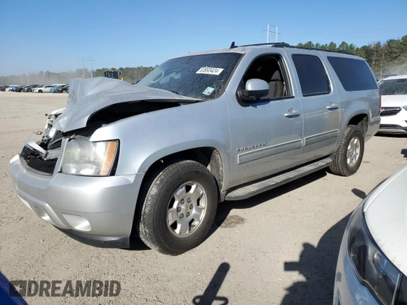 2011 Chevrolet Suburban LS with VIN 1GNSCHE03BR292854, listed as a Copart auction lot 82693424 with 187,104 mi miles and Salvage Title. Bid and sale history available at carsss.com. Image 1.