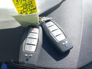 2022 Mitsubishi Outlander SE z VIN JA4J4UA82NZ050917, wystawiony jako IAAI lot #41971485 z przebiegiem 53 678 mil mil oraz . Historia ofert i sprzedaży dostępna na DreamBid. Obrazek 11.