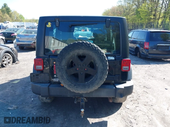 2012 Jeep Wrangler Unlimited Sport z VIN 1C4BJWDG1CL220511, wystawiony jako IAAI lot #42227037 z przebiegiem 157 914 mil mil oraz . Historia ofert i sprzedaży dostępna na DreamBid. Obrazek 16.