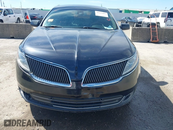 2014 Lincoln MKS with VIN 1LNHL9DK1EG604323, listed as a IAAI auction lot 41635817 with 223,136 mi miles. Bid and sale history available at carsss.com. Image 12.