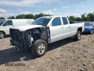 2015 GMC Sierra 2500HD SLE with VIN 1GT22YEG6FZ525804, listed as a Copart auction lot 65166085 with 194,849 mi miles and Salvage title. Bid and sale history available at DreamBid. Image 1.