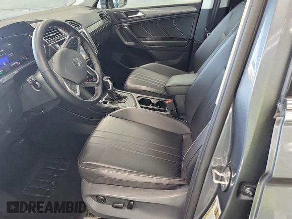 2024 Volkswagen Tiguan SE with VIN 3VV3B7AX5RM107598, listed as a IAAI auction lot 42796418 with 25,762 mi miles and . Bid and sale history available at DreamBid. Image 10.