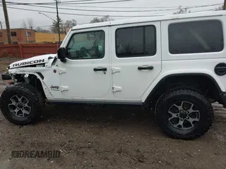 2018 Jeep Wrangler Unlimited Rubicon with VIN 1C4HJXFG6JW301254, listed as a IAAI auction lot 41654089 with 71,364 mi miles and . Bid and sale history available at DreamBid. Image 14.