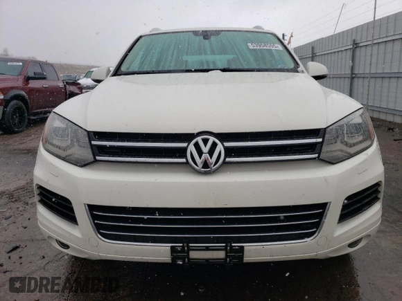 2011 Volkswagen Touareg Sport with VIN WVGFF9BP8BD002982, listed as a Copart auction lot 53958555 with 156,742 mi miles and Salvage Title. Bid and sale history available at DreamBid. Image 5.