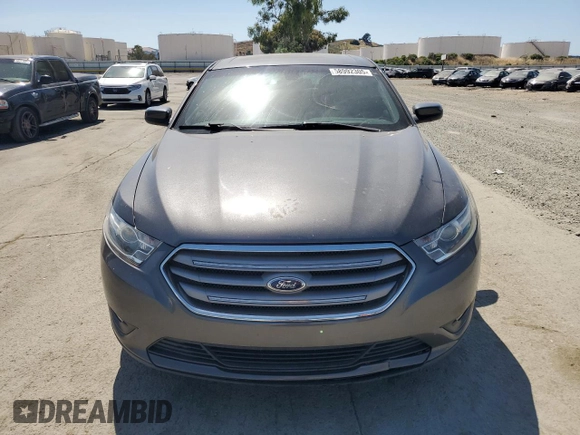 2015 Ford Taurus SEL with VIN 1FAHP2E8XFG209390, listed as a Copart auction lot 58992305 with 99,498 mi miles and Salvage title. Bid and sale history available at DreamBid. Image 5.