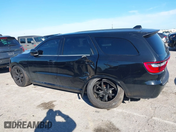 2021 Dodge Durango R/T with VIN 1C4SDJCT3MC806766, listed as a IAAI auction lot 41426865 with 62,919 mi miles and . Bid and sale history available at DreamBid. Image 6.
