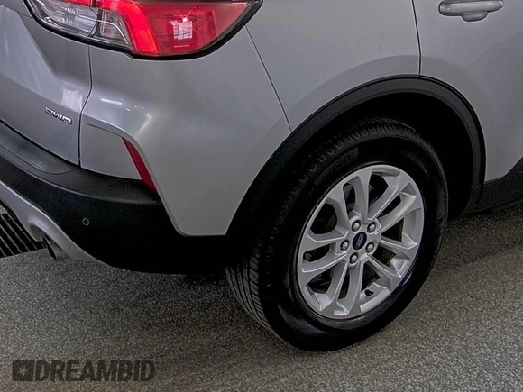 2022 Ford Escape SE z VIN 1FMCU9G66NUB33504, wystawiony jako IAAI lot #42748133 z przebiegiem 74 338 mil mil oraz . Historia ofert i sprzedaży dostępna na DreamBid. Obrazek 4.