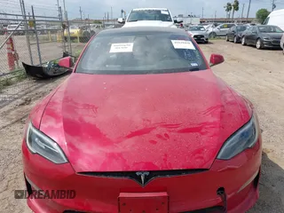 2022 Tesla Model S with VIN 5YJSA1E58NF486727, listed as a IAAI auction lot 42139418 with Not provided miles and . Bid and sale history available at DreamBid. Image 10.