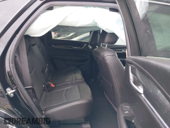 2021 Cadillac XT5 FWD Premium Luxury with VIN 1GYKNCRS3MZ103893, listed as a IAAI auction lot 41286761 with 75,728 mi miles and . Bid and sale history available at carsss.com. Image 8.