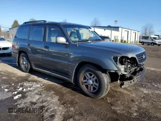2000 Lexus LX 470 z VIN JT6HT00W1Y0084900, wystawiony jako Copart lot #41480235 z przebiegiem 213 577 mil mil oraz Szkoda całkowita • Salvage title. Historia ofert i sprzedaży dostępna na DreamBid. Obrazek 4.
