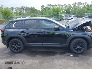 2025 Mazda CX-50 S Select with VIN 7MMVABAMXSN326118, listed as a IAAI auction lot 42136197 with 5,142 mi miles and . Bid and sale history available at DreamBid. Image 13.