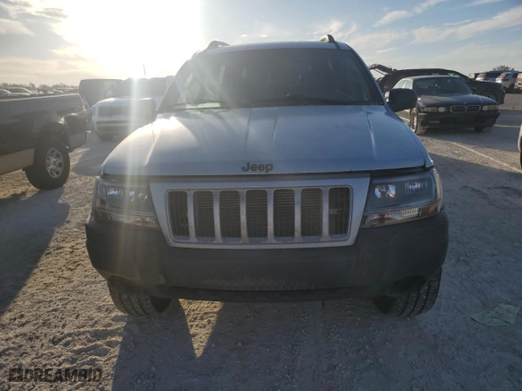 2004 Jeep Grand Cherokee Laredo with VIN 1J4GX48N74C406647, listed as a Copart auction lot 77631654 with 174,824 mi miles and Salvage Title. Bid and sale history available at carsss.com. Image 5.
