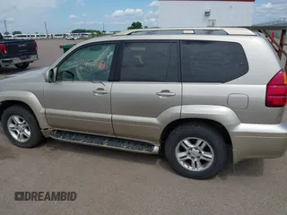 2003 Lexus GX 470 z VIN JTJBT20X930014196, wystawiony jako IAAI lot #42467486 z przebiegiem 282 962 mil mil oraz . Historia ofert i sprzedaży dostępna na DreamBid. Obrazek 14.