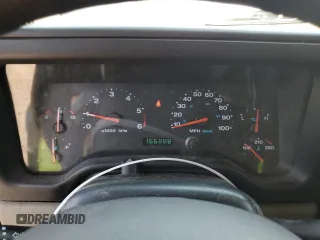 2004 Jeep Wrangler SE with VIN 1J4FA29164P797604, listed as a Copart auction lot 59978155 with 166,888 mi miles and Clean title. Bid and sale history available at DreamBid. Image 9.