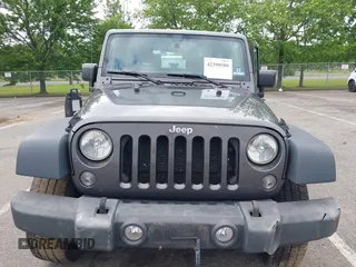 2016 Jeep Wrangler Willys Wheeler with VIN 1C4GJWAG2GL318981, listed as a IAAI auction lot 42390588 with 131,559 mi miles and . Bid and sale history available at DreamBid. Image 12.