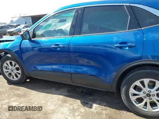 2023 Ford Escape Active with VIN 1FMCU0GNXPUA27448, listed as a IAAI auction lot 41670289 with 18,836 mi miles and . Bid and sale history available at DreamBid. Image 14.