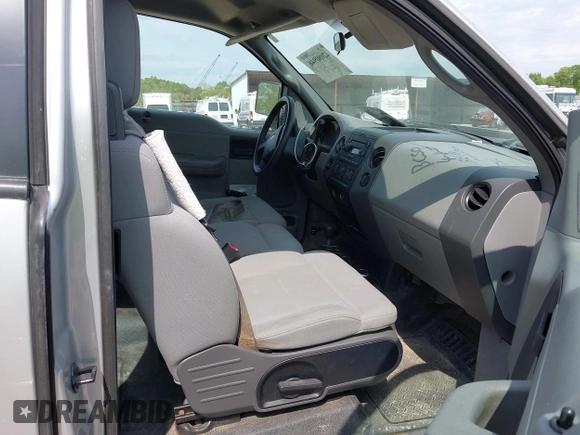 2005 Ford F-150 STX with VIN 1FTRX14W55FA69973, listed as a IAAI auction lot 42080948 with 250,000 mi miles and . Bid and sale history available at carsss.com. Image 5.