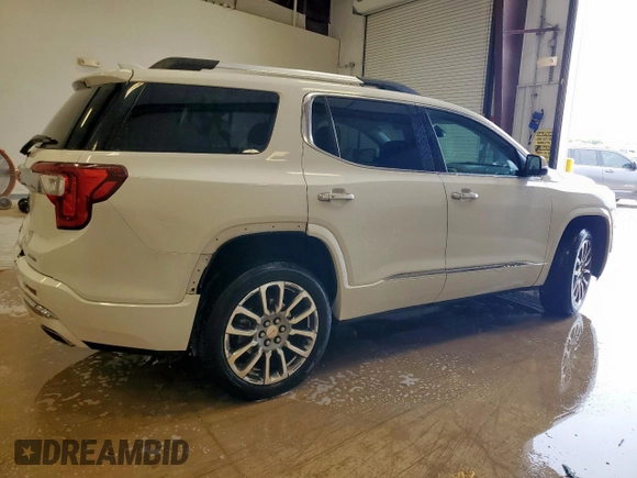 2023 GMC Acadia Denali z VIN 1GKKNXL44PZ226330, wystawiony jako Copart lot #59170705 z przebiegiem 46 170 mil mil oraz Czysty tytuł • Clean title. Historia ofert i sprzedaży dostępna na DreamBid. Obrazek 3.