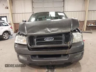 2005 Ford F-150 STX with VIN 1FTRX12W95NB38107, listed as a IAAI auction lot 41185100 with 201,171 mi miles. Bid and sale history available at carsss.com. Image 12.