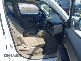2014 Jeep Patriot Sport with VIN 1C4NJPBB3ED618570, listed as a IAAI auction lot 42126639 with 157,005 mi miles and . Bid and sale history available at DreamBid. Image 5.
