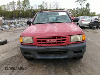 1998 Isuzu Rodeo S z VIN 4S2CK58WXW4325645, wystawiony jako IAAI lot #42013228 z przebiegiem 300 698 mil mil oraz . Historia ofert i sprzedaży dostępna na DreamBid. Obrazek 12.