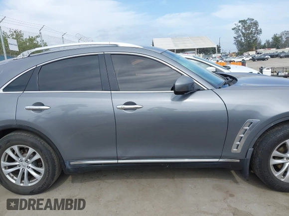 2014 Infiniti QX70 with VIN JN8CS1MU8EM450428, listed as a IAAI auction lot 42233727 with 88,342 mi miles and . Bid and sale history available at DreamBid. Image 13.