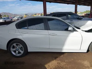 2014 BMW 3 Series 328i with VIN WBA3C1C53EK113046, listed as a IAAI auction lot 42665663 with Not provided miles and . Bid and sale history available at DreamBid. Image 13.