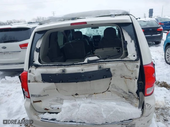 2012 Dodge Grand Caravan SE with VIN 2C4RDGBG2CR419489, listed as a IAAI auction lot 41270114 with 124,869 mi miles. Bid and sale history available at carsss.com. Image 6.