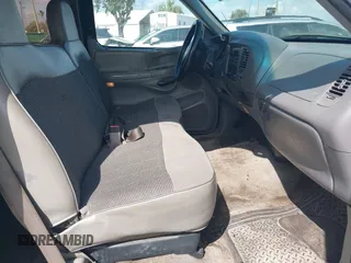 1997 Ford F-150 XL with VIN 1FTDX1868VKA12923, listed as a IAAI auction lot 41526986 with 343,755 mi miles. Bid and sale history available at carsss.com. Image 5.