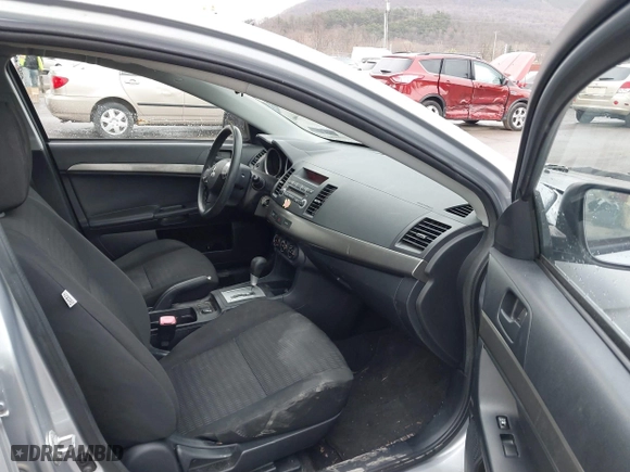 2013 Mitsubishi Lancer SE with VIN JA32V2FW7DU015061, listed as a IAAI auction lot 41863621 with 141,315 mi miles. Bid and sale history available at carsss.com. Image 5.