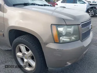 2007 Chevrolet Suburban LS with VIN 1GNFC16JX7R225286, listed as a IAAI auction lot 41594303 with 213,648 mi miles. Bid and sale history available at carsss.com. Image 12.