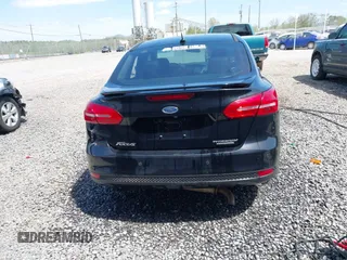 2016 Ford Focus Titanium z VIN 1FADP3J28GL393422, wystawiony jako IAAI lot #42075513 z przebiegiem 146 535 mil mil oraz . Historia ofert i sprzedaży dostępna na DreamBid. Obrazek 16.