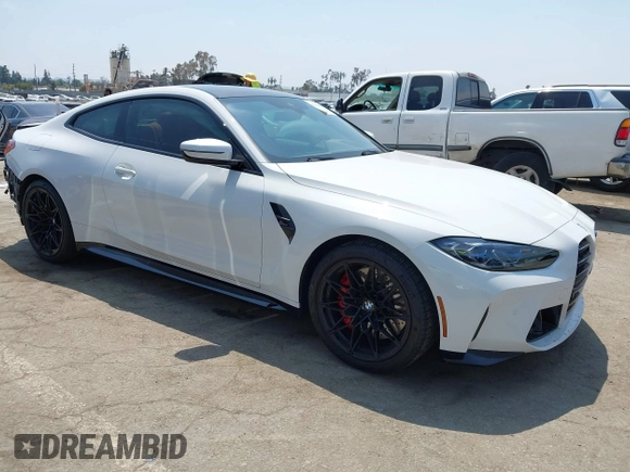 2022 BMW M4 Competition z VIN WBS33AZ04NCJ20752, wystawiony jako IAAI lot #42153801 z przebiegiem 9 523 mil mil oraz . Historia ofert i sprzedaży dostępna na DreamBid. Obrazek 1.