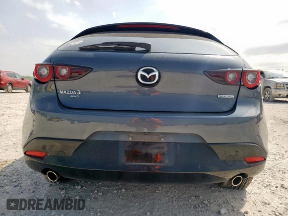 2024 Mazda 3 S Carbon Edition with VIN JM1BPBLM6R1657648, listed as a Copart auction lot 57335935 with 26,462 mi miles and Salvage title. Bid and sale history available at DreamBid. Image 6.