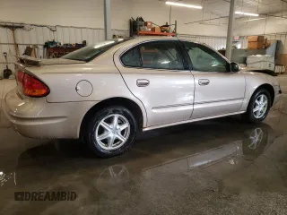 2002 Oldsmobile Alero GL1 z VIN 1G3NL52F52C133589, wystawiony jako Copart lot #77093824 z przebiegiem 150 353 mil mil oraz Szkoda całkowita • Salvage title. Historia ofert i sprzedaży dostępna na DreamBid. Obrazek 3.