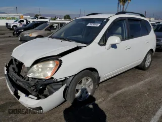 2009 Kia Rondo LX with VIN KNAFG529X97273401, listed as a Copart auction lot 75829094 with 171,062 mi miles and Salvage Title. Bid and sale history available at carsss.com. Image 1.