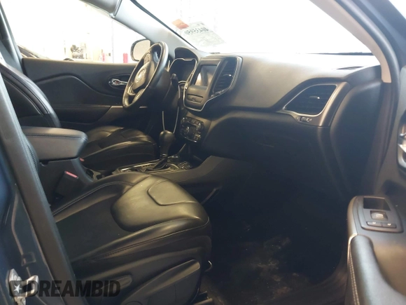 2019 Jeep Cherokee Latitude Plus with VIN 1C4PJMLX0KD361879, listed as a IAAI auction lot 40435950 with 148,830 mi miles. Bid and sale history available at carsss.com. Image 5.